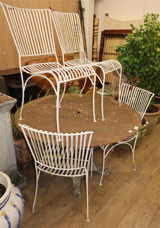 A circular metal garden table and four chairs, Diam.116cm, H.73cm